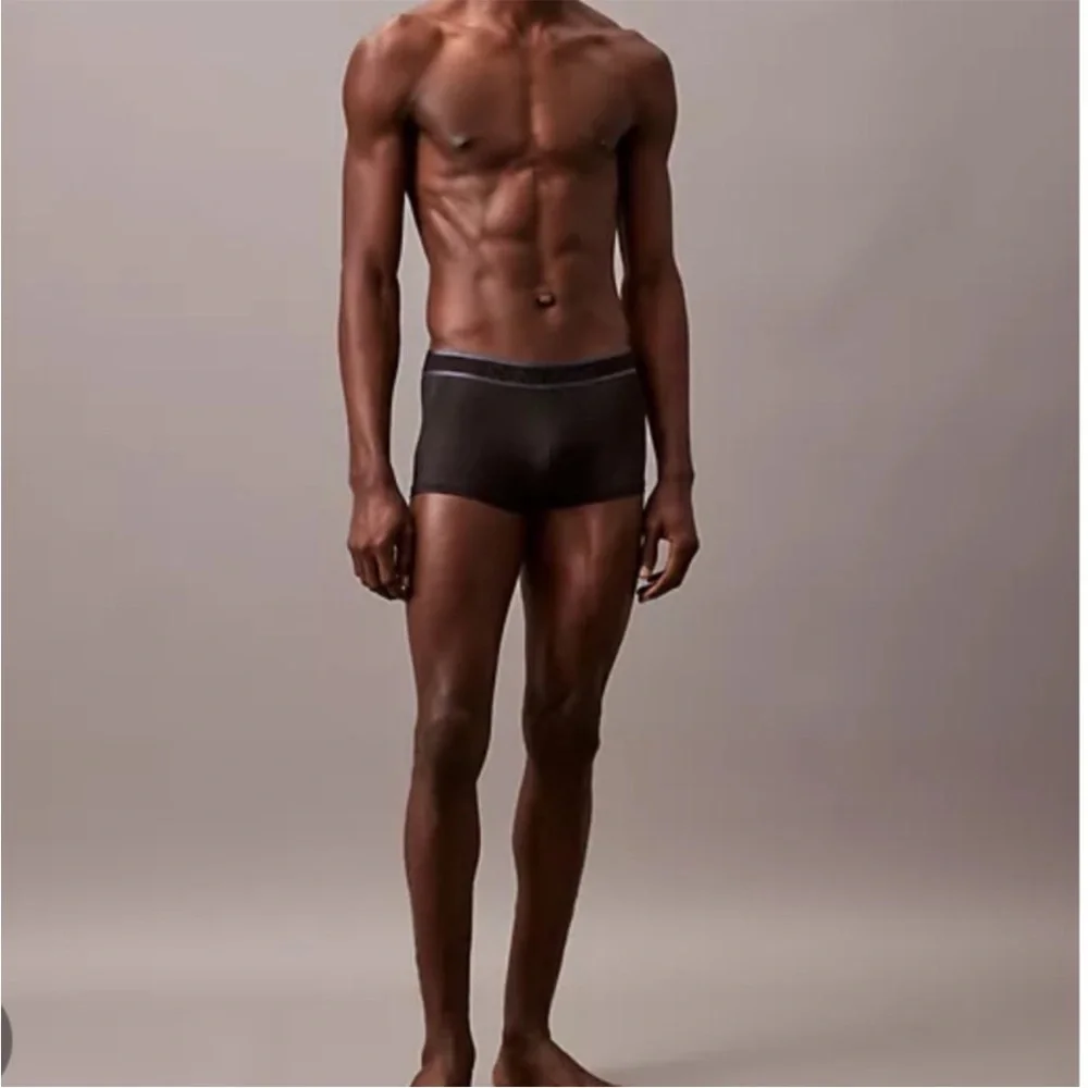 Calvin Klein | Tonal Logo Low Rise Trunks in Black (Medium)